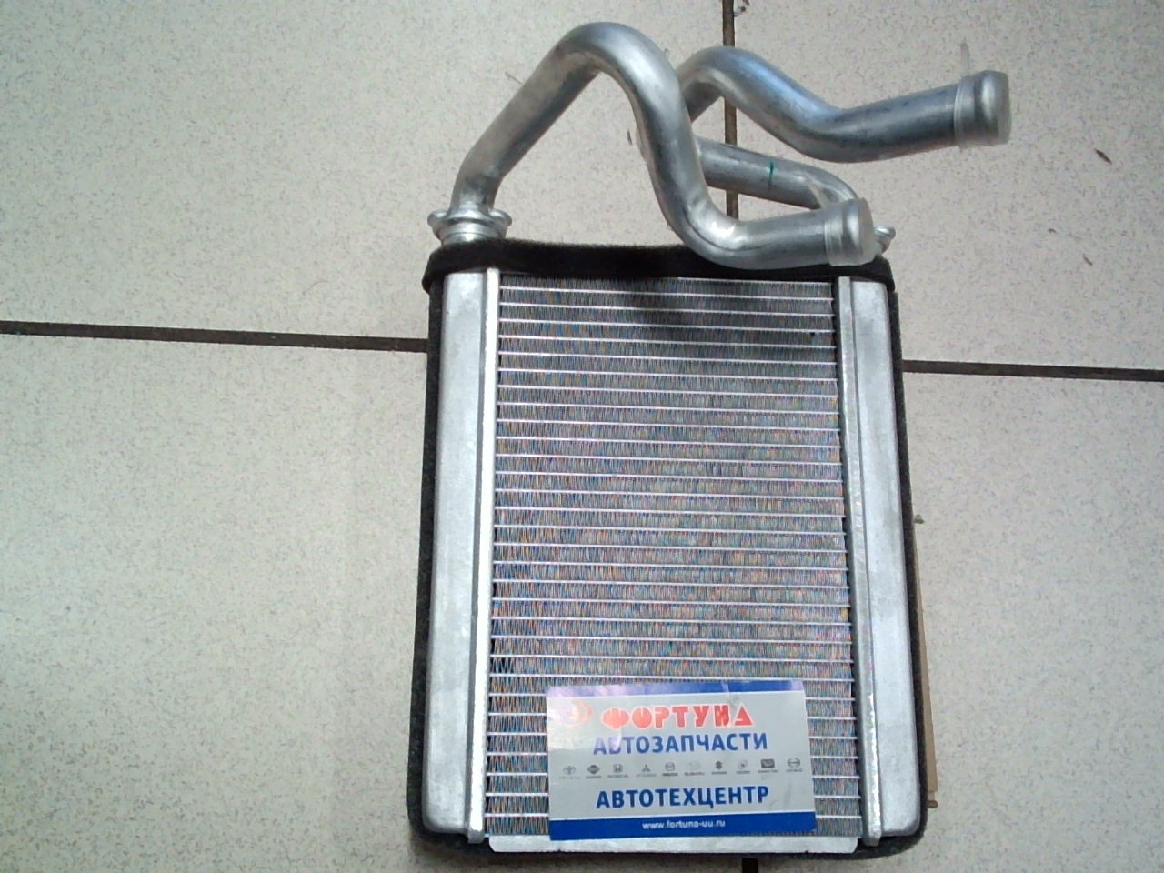 Радиатор печки HR-105-26-K GSParts /NCP10, NCP20 TOYOTA FUNCARGO, VITZ, PLATZ 1999-2005/ на  